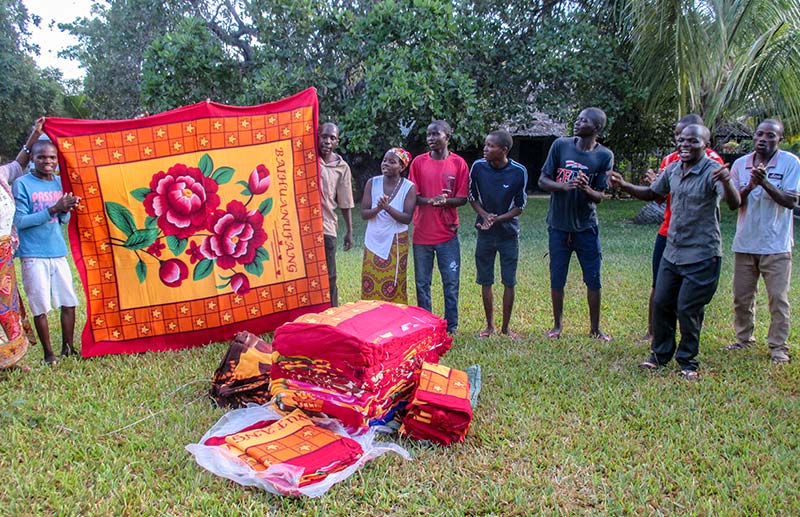 Distributing blankets for five-day evangelism outreach